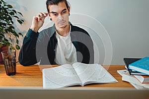 College student at campus while studying virtual learning for pass exam to university