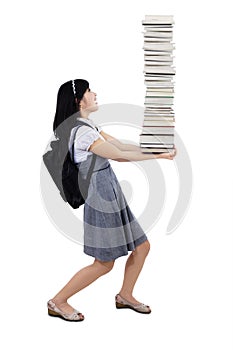 College student holding pile of books