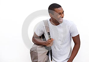 College student laughing with bag