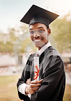 College student, portrait and black man at graduation with a diploma and smile outdoor. Male person happy to celebrate