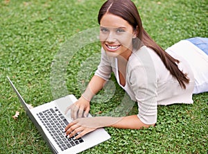 College student, portrait and woman with laptop in park on campus with research, project and education. University