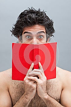 College student reading an interesting book photo