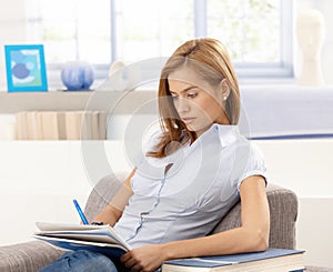 College student studying at home