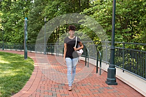 A College student walking on campus