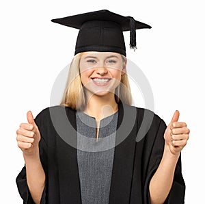 College Student Wearing Graduation Gown Gesturing