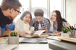 College students in cooperation with their assignment at library