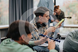 College students engaged in interactive music class session