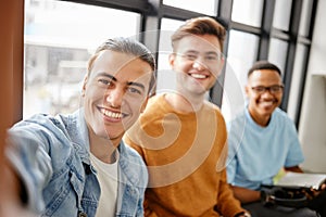 College students selfie, men friends and social media at university, school and campus. Diversity, happy portrait