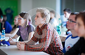 College students sitting in a classroom during class