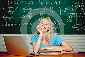 College students studying. Education. Student girl reading a presentation on laptop. Education study abroad. Female