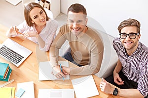 College students studying together at home