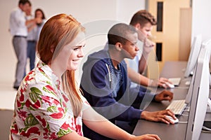 College Students Using Computers On Media Studies Course photo