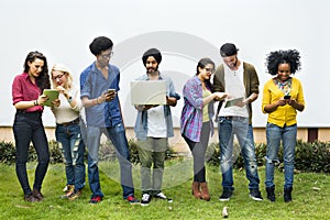 College Students Using Digital Devices Concept