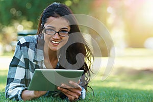 College, woman and portrait with tablet in park for research, project or learning outdoor on campus. University, student