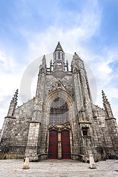 Collegiate Church Saint-Aubin in Guerande medieval town, as viewed from de la Psalette square. Loire-Atlantique region in Western