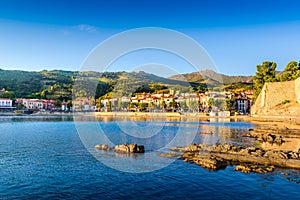 Collioure bay with rocks and beach at morning in France