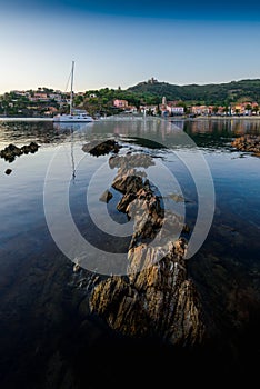 Collioure bay with rocks and beach at sunrise in France