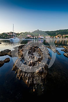 Collioure bay with rocks and beach at sunrise in France