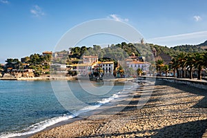 Collioure view from the beach with the Mill on the top of the village