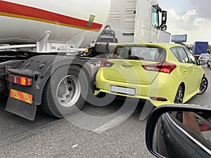 Collision of cars on the road. Crash of a truck and a car on the highway. Concept: Traffic accident in the city