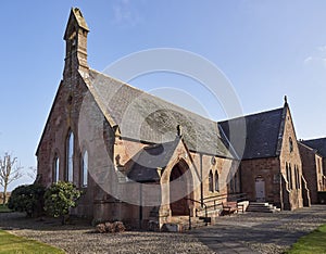 Colliston Parish Church, built in 1870 by the Victorians stands next to its Old Manse at the end of the Village.