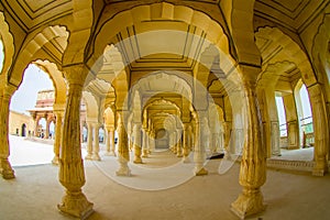 Collumned yellow hall in Sattais Katcheri in Amber Fort near Jaipur, Rajasthan, India. Amber Fort is the main tourist