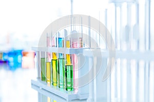 Coloful mix color chemical in test tube in chemical laboratory or Medical research lab colorful liquid for advance medical