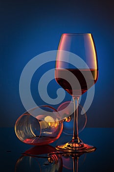 Coloful wineglass on table.