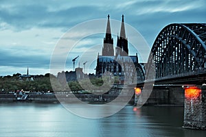 Cologne Cathedral and the Hohenzollern Bridge at dusk