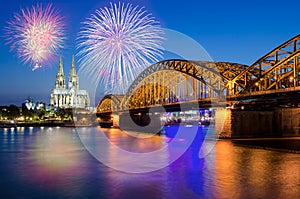 Cologne Cathedral and Hohenzollern Bridge with Fireworks