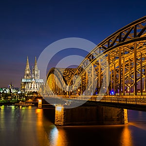 Cologne cathedral and hohenzollern bridge at night