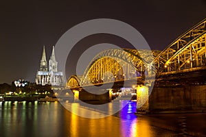 Cologne Cathedral and Hohenzollern Bridge at night, Cologne (Koeln), Germany