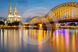 Cologne Cathedral and Hohenzollern Bridge at night, Germany