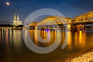 Cologne Cathedral and Hohenzollern Bridge at night, Germany