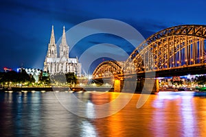 Cologne Cathedral and Hohenzollern Bridge, Cologne, Germany at night