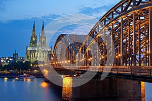 Cologne Cathedral and Hohenzollern Bridge at sunset