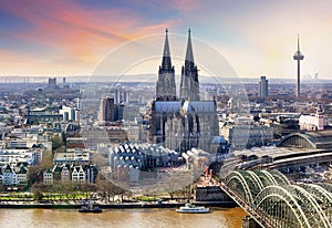 Cologne Cathedral and Hohenzollern Bridge at sunset - night