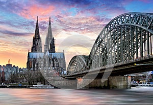 Cologne Cathedral and Hohenzollern Bridge at sunset - night