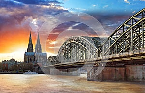 Cologne Cathedral and Hohenzollern Bridge at sunset - night