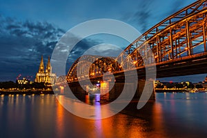 Cologne Cathedral and Hohenzollern Bridge at twilight, Germany