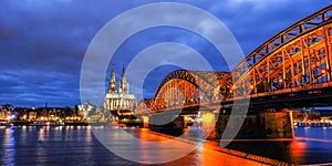 Cologne Cathedral and Hohenzollern Bridge at Twilight Time in Germany