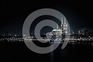 Cologne Cathedral at river rhine night shot