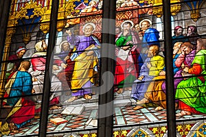 COLOGNE, GERMANY - AUGUST 26: Stained glass church window with Pentecost theme in the cathedral on August 26, 2014 in Cologne