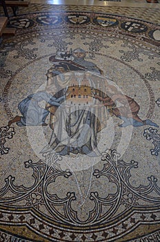 Cologne, Germany - Inlaid marble floor with figure of saints