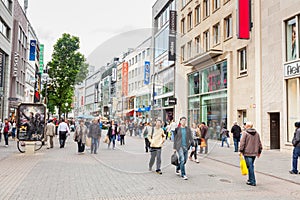 COLOGNE, GERMANY - MAY 07, 2014: Crowded shopping street in Colo