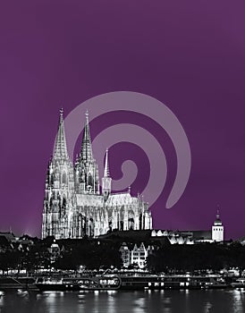 Cologne, Germany. Night View Of Cologne Cathedral. Catholic Gothic Cathedral In Night. UNESCO World Heritage Site. Toned