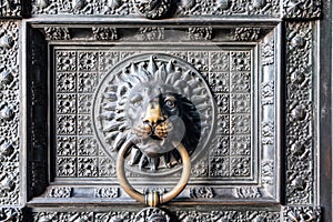 Detail of old door of Cologne Cathedral in Germany. photo