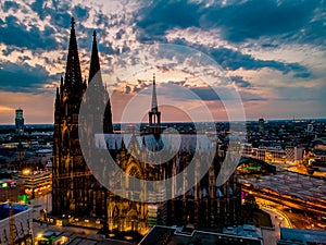 Cologne Koln Cathedral during sunset , drone aerial vie over Cologne and the river rhein during sunset in Germany Europe