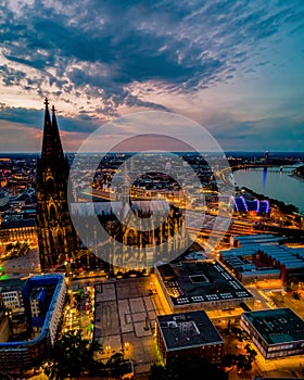 Cologne Koln Cathedral during sunset , drone aerial vie over Cologne and the river rhein during sunset in Germany Europe