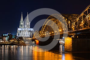 Cologne skyline with Cologne Cathedral and Hohenzollern bridge at night